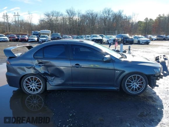 2008 Mitsubishi Lancer Evolution GSR with VIN JA3AW86V18U044077, listed as a IAAI auction lot 41208625 with 157,788 mi miles. Bid and sale history available at carsss.com. Image 13.