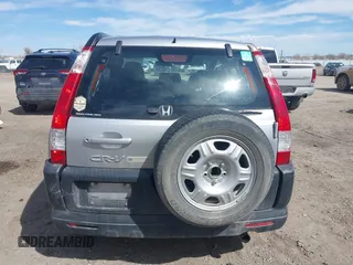 2006 Honda CR-V LX with VIN JHLRD785X6C057434, listed as a IAAI auction lot 41881971 with 210,658 mi miles and . Bid and sale history available at carsss.com. Image 16.