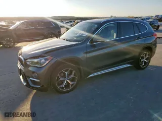 2019 BMW X1 xDrive28i with VIN WBXHT3C51K3H34687, listed as a Copart auction lot 50135845 with 59,549 mi miles and Salvage Title. Bid and sale history available at carsss.com. Image 1.