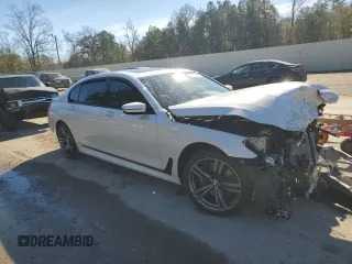 2018 BMW 7 Series 740i with VIN WBA7E2C59JG743247, listed as a Copart auction lot 88777325 with 69,071 mi miles and Salvage Title. Bid and sale history available at carsss.com. Image 4.