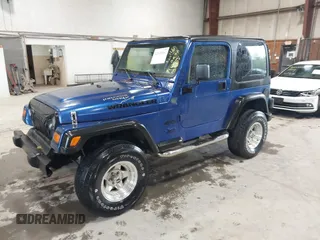 1998 Jeep Wrangler SE with VIN 1J4FY29PXWP769503, listed as a IAAI auction lot 42535360 with 94,634 mi miles and . Bid and sale history available at DreamBid. Image 2.