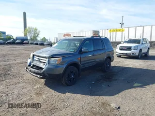 2008 Honda Pilot VP with VIN 5FNYF18208B008772, listed as a IAAI auction lot 42098599 with 186,981 mi miles and . Bid and sale history available at DreamBid. Image 2.