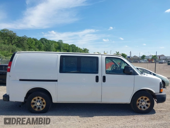 2014 Chevrolet Express Cargo with VIN 1GCSGAFX5E1152985, listed as a IAAI auction lot 42483478 with 208,518 mi miles and . Bid and sale history available at DreamBid. Image 13.