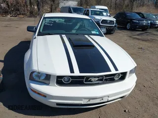 2009 Ford Mustang with VIN 1ZVHT80N895111445, listed as a IAAI auction lot 41778658 with 121,122 mi miles and . Bid and sale history available at carsss.com. Image 6.