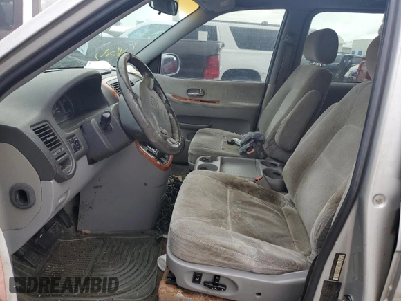 2004 Kia Sedona LX with VIN KNDUP131446570061, listed as a Copart auction lot 74222344 with 0 mi miles and Salvage Title. Bid and sale history available at carsss.com. Image 7.