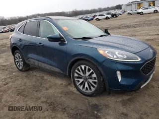 2020 Ford Escape Titanium z VIN 1FMCU9J91LUA73891, wystawiony jako Copart lot #89178475 z przebiegiem 35 579 mil mil oraz Szkoda całkowita • Salvage title. Historia ofert i sprzedaży dostępna na DreamBid. Obrazek 4.