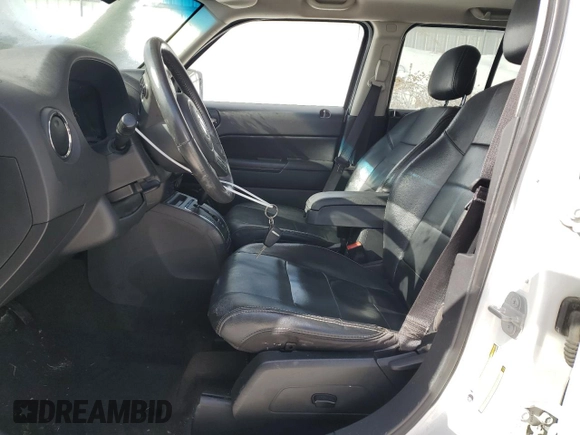 2014 Jeep Patriot Latitude with VIN 1C4NJPFA9ED887934, listed as a Copart auction lot 45456955 with 179,990 mi miles and Clean Title. Bid and sale history available at carsss.com. Image 7.