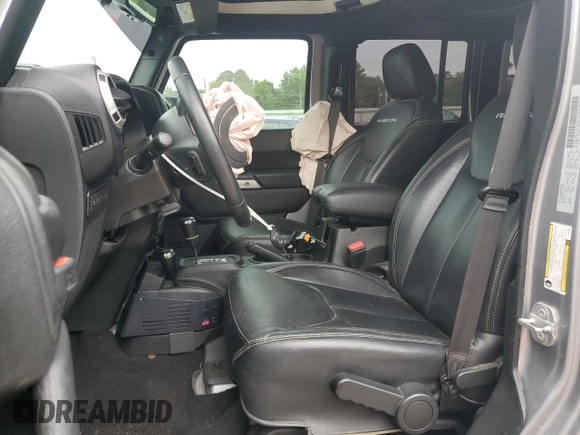 2018 Jeep Wrangler Unlimited Rubicon Recon z VIN 1C4HJWFGXJL840598, wystawiony jako Copart lot #59399595 z przebiegiem 63 298 mil mil oraz Szkoda całkowita • Salvage title. Historia ofert i sprzedaży dostępna na DreamBid. Obrazek 7.