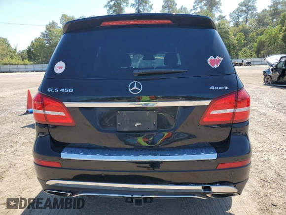 2018 Mercedes-Benz GLS with VIN 4JGDF6EE1JB084032, listed as a Copart auction lot 68464143 with 99,904 mi miles. Bid and sale history available at carsss.com. Image 6.
