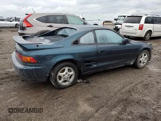 1992 Toyota MR2 z VIN JT2SW22N5N0058195, wystawiony jako Copart lot #74886194 z przebiegiem 158 816 mil mil oraz Nie do naprawy. Historia ofert i sprzedaży dostępna na DreamBid. Obrazek 3.