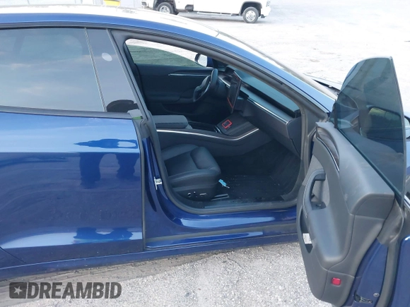 2023 Tesla Model S with VIN 5YJSA1E53PF518986, listed as a IAAI auction lot 41223046 with 22,204 mi miles and . Bid and sale history available at DreamBid. Image 5.