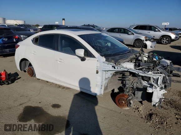 2015 Mazda 3 S Touring with VIN JM1BM1V37F1221443, listed as a Copart auction lot 88286695 with Not Provided miles and Salvage Title. Bid and sale history available at DreamBid. Image 4.