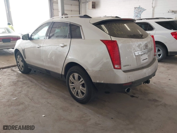 2014 Cadillac SRX Luxury Collection with VIN 3GYFNEE35ES681424, listed as a IAAI auction lot 41854969 with 135,163 mi miles. Bid and sale history available at carsss.com. Image 3.