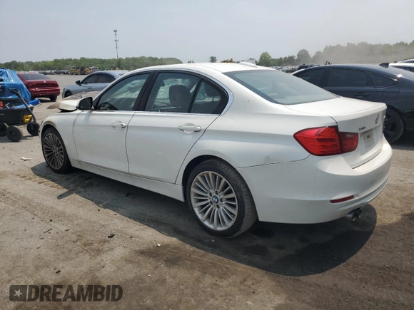 2013 BMW 3 Series 328i xDrive with VIN WBA3B5C55DF592149, listed as a Copart auction lot 59228605 with Not provided miles and Salvage title. Bid and sale history available at DreamBid. Image 2.