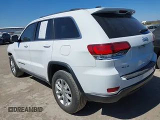 2021 Jeep Grand Cherokee Laredo E with VIN 1C4RJFAG5MC579865, listed as a IAAI auction lot 41818874 with 105,489 mi miles and . Bid and sale history available at DreamBid. Image 3.