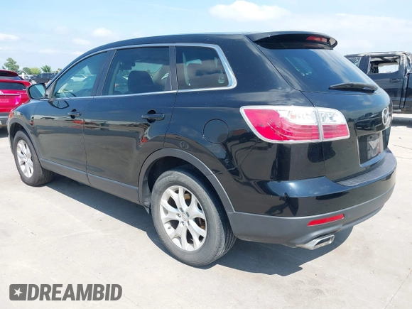 2011 Mazda CX-9 Sport with VIN JM3TB2BA7B0303120, listed as a IAAI auction lot 42427053 with 219,673 mi miles and . Bid and sale history available at DreamBid. Image 3.