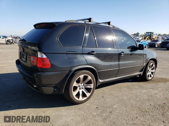 2005 BMW X5 4.8is with VIN 5UXFA93515LE83489, listed as a Copart auction lot 87840265 with 131,786 mi miles and Salvage Title. Bid and sale history available at carsss.com. Image 3.