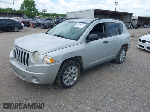 2007 Jeep Compass Sport with VIN 1J8FF47W97D279230, listed as a IAAI auction lot 42207379 with 205,058 mi miles and . Bid and sale history available at carsss.com. Image 2.