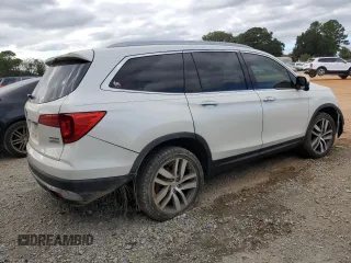 2017 Honda Pilot Touring z VIN 5FNYF6H92HB067140, wystawiony jako Copart lot #72200584 z przebiegiem 127 856 mil mil oraz Szkoda całkowita • Salvage title. Historia ofert i sprzedaży dostępna na DreamBid. Obrazek 3.