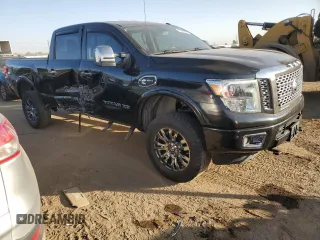 2016 Nissan Titan XD Platinum Reserve with VIN 1N6BA1F40GN506668, listed as a Copart auction lot 76357204 with 89,839 mi miles and Salvage Title. Bid and sale history available at carsss.com. Image 4.