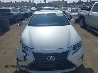 2016 Lexus ES 300h with VIN JTHBW1GGXG2113791, listed as a IAAI auction lot 41116740 with 188,974 mi miles and . Bid and sale history available at DreamBid. Image 12.