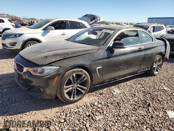 2015 BMW 4 Series 428i with VIN WBA3V7C56FP771719, listed as a Copart auction lot 88008765 with 85,572 mi miles and Salvage Title. Bid and sale history available at carsss.com. Image 1.