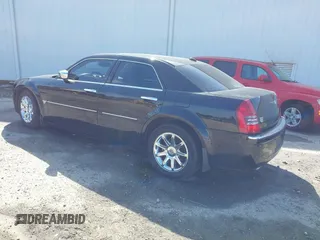 2005 Chrysler 300 with VIN 2C3AA63H65H145122, listed as a IAAI auction lot 41847043 with 237,757 mi miles. Bid and sale history available at carsss.com. Image 3.