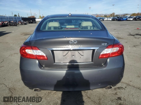 2012 Infiniti M37 with VIN JN1BY1AP8CM333839, listed as a Copart auction lot 84052134 with 121,979 mi miles and Salvage Title. Bid and sale history available at carsss.com. Image 6.