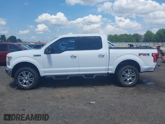 2015 Ford F-150 XLT with VIN 1FTEW1EFXFKD32631, listed as a IAAI auction lot 42454554 with 162,104 mi miles and . Bid and sale history available at DreamBid. Image 14.