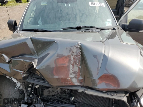 2018 Ford F-150 XL z VIN 1FTFX1EG9JFE34899, wystawiony jako Copart lot #60716205 z przebiegiem 71 187 mil mil oraz Szkoda całkowita • Salvage title. Historia ofert i sprzedaży dostępna na DreamBid. Obrazek 11.