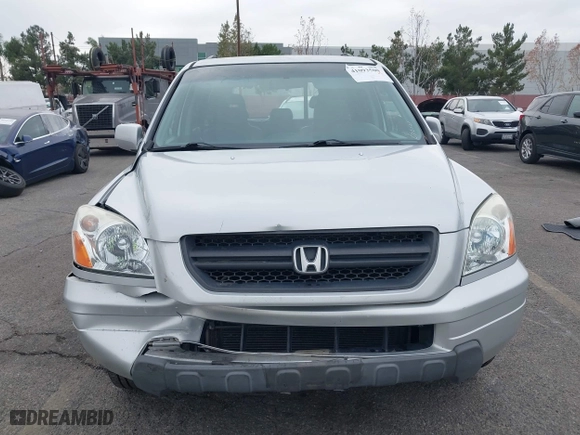 2004 Honda Pilot EX with VIN 2HKYF18644H596075, listed as a IAAI auction lot 41093500 with 92,952 mi miles. Bid and sale history available at carsss.com. Image 12.