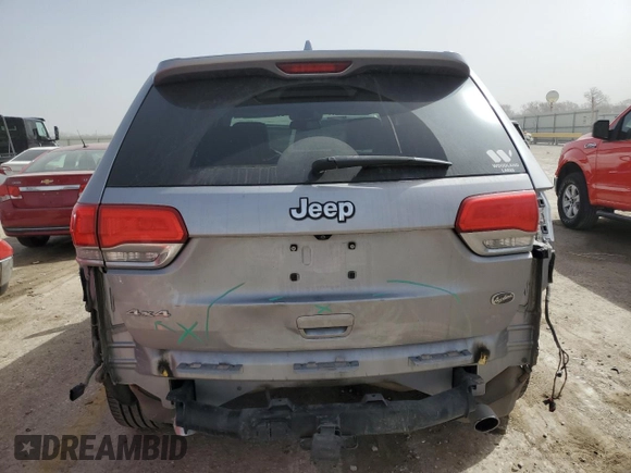 2014 Jeep Grand Cherokee Overland with VIN 1C4RJFCG4EC326325, listed as a Copart auction lot 49166645 with 128,261 mi miles and Salvage Title. Bid and sale history available at DreamBid. Image 6.