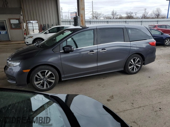 2022 Honda Odyssey Touring with VIN 5FNRL6H85NB023052, listed as a Copart auction lot 50884735 with 54,952 mi miles and Salvage Title. Bid and sale history available at DreamBid. Image 1.