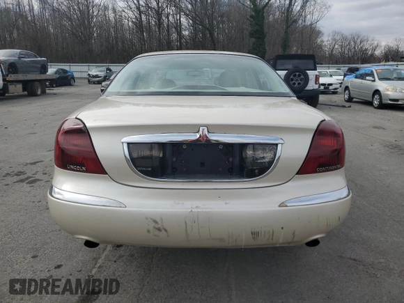 2001 Lincoln Continental z VIN 1LNHM97V71Y711352, wystawiony jako Copart lot #46235305 z przebiegiem 122 786 mil mil oraz Szkoda całkowita • Salvage title. Historia ofert i sprzedaży dostępna na DreamBid. Obrazek 6.