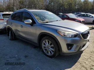 2015 Mazda CX-5 Grand Touring with VIN JM3KE4DY5F0460465, listed as a Copart auction lot 46392605 with 103,185 mi miles and Salvage Title. Bid and sale history available at carsss.com. Image 4.