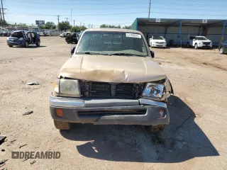 1999 Toyota Tacoma with VIN 4TAWN72N4XZ560411, listed as a Copart auction lot 61499925 with 395,215 mi miles and Salvage title. Bid and sale history available at DreamBid. Image 5.