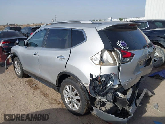 2019 Nissan Rogue SV with VIN KNMAT2MT0KP527901, listed as a IAAI auction lot 42260779 with 102,975 mi miles and . Bid and sale history available at DreamBid. Image 3.