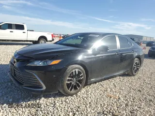 2023 Toyota Camry LE with VIN 4T1C11AK2PU731804, listed as a Copart auction lot 49065865 with 24,773 mi miles and Salvage Title. Bid and sale history available at carsss.com. Image 1.
