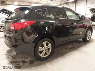 2013 Hyundai Tucson GLS with VIN KM8JU3AC0DU754948, listed as a IAAI auction lot 41811891 with 139,056 mi miles. Bid and sale history available at carsss.com. Image 4.