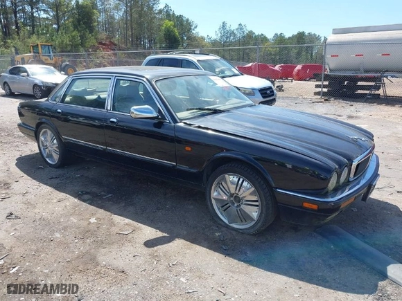 1996 Jaguar XJ Series Sedan Vanden Plas with VIN SAJKX6245TC780444, listed as a IAAI auction lot 41856403 with 1 mi miles. Bid and sale history available at carsss.com. Image 1.