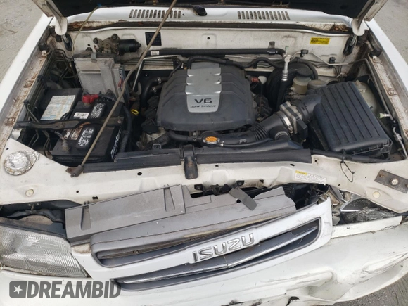 2000 Isuzu Trooper S with VIN JACDJ58X6Y7J06807, listed as a Copart auction lot 79179454 with 157,308 mi miles and Salvage title. Bid and sale history available at DreamBid. Image 12.