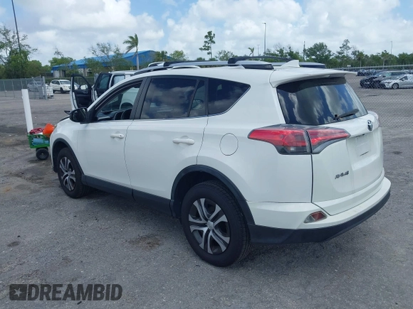 2016 Toyota RAV4 LE with VIN JTMZFREV2GJ096782, listed as a IAAI auction lot 41945319 with 76,866 mi miles. Bid and sale history available at carsss.com. Image 12.