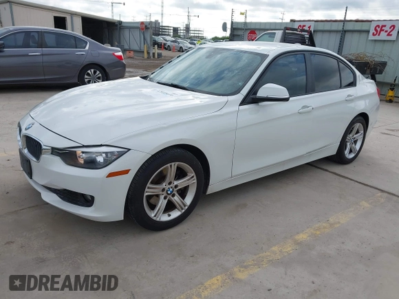 2015 BMW 3 Series 320i with VIN WBA3B1C50FK139723, listed as a IAAI auction lot 42035410 with 185,169 mi miles and . Bid and sale history available at DreamBid. Image 18.