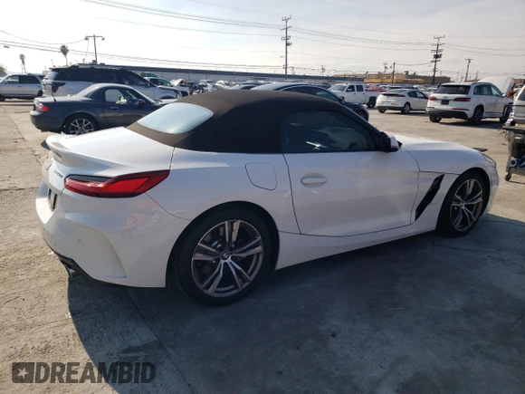 2023 BMW Z4 sDrive30i with VIN WBAHF3C06PWY01020, listed as a Copart auction lot 43236464 with 6,860 mi miles. Bid and sale history available at carsss.com. Image 3.