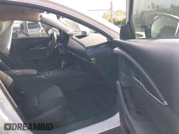 2023 Mazda CX-30 S with VIN 3MVDMBAM8PM545288, listed as a IAAI auction lot 42198433 with 19,609 mi miles and . Bid and sale history available at DreamBid. Image 5.