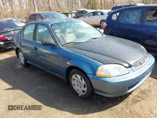 1997 Honda Civic LX with VIN 2HGEJ6673VH548783, listed as a IAAI auction lot 41748312 with 146,947 mi miles. Bid and sale history available at carsss.com. Image 1.