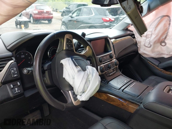 2016 GMC Yukon Denali with VIN 1GKS1CKJXGR254306, listed as a IAAI auction lot 39953539 with 164,149 mi miles. Bid and sale history available at carsss.com. Image 5.