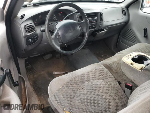2000 Ford F-150 XL z VIN 1FTRX17WXYNB88124, wystawiony jako Copart lot #43602225 z przebiegiem Nie podano mil oraz Szkoda całkowita • Salvage title. Historia ofert i sprzedaży dostępna na DreamBid. Obrazek 8.