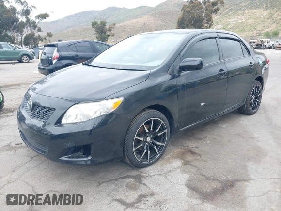 2010 Toyota Corolla with VIN 1NXBU4EE9AZ268818, listed as a IAAI auction lot 42058417 with 115,124 mi miles. Bid and sale history available at carsss.com. Image 2.