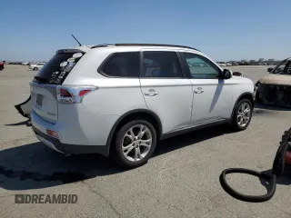 2015 Mitsubishi Outlander SE with VIN JA4AD3A38FZ002614, listed as a Copart auction lot 57643295 with 95,419 mi miles and Salvage title. Bid and sale history available at DreamBid. Image 3.